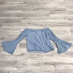 Off the shoulder shirt.